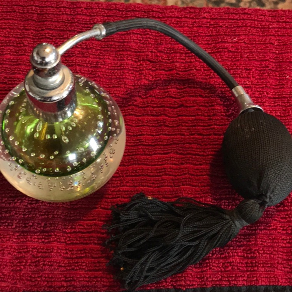1983 green glass perfume atomizer spray bottle.